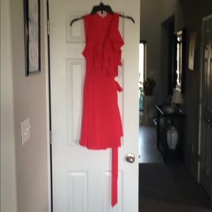 Cute, coral fit and flair faux wrap dress